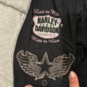 Harley-Davidson. Long sleeve. Button up shirt. Black with grey writing. Size L.